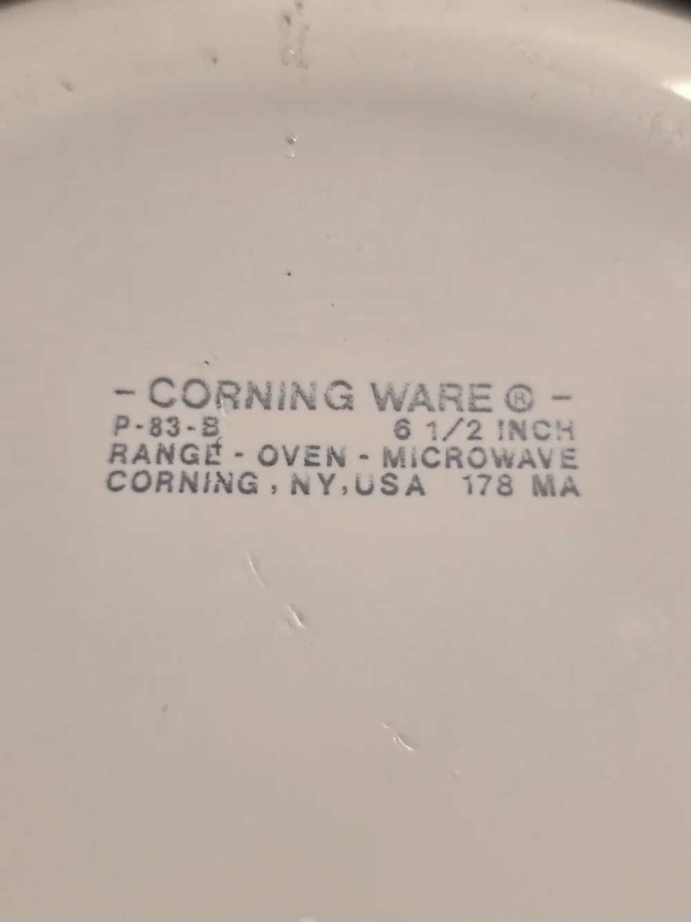 The Corning Ware Wildflower Saucepan/Skillet with Pyrex Lids.